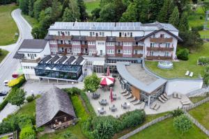 an aerial view of a hotel with a courtyard at Vital-Hotel-Styria in Fladnitz an der Teichalm