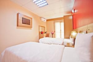 Cama o camas de una habitación en Avcilar Vizyon Hotel