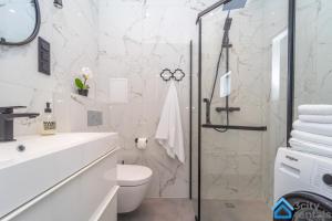Kúpeľňa v ubytovaní Nowoczesny Apartament 3city w Gdyni z Parkingiem by Noclegi Renters