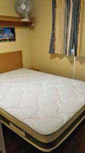 Llit o llits en una habitació de Camping baradis