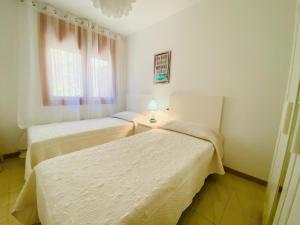 Posteľ alebo postele v izbe v ubytovaní Irta 3 dormitorios