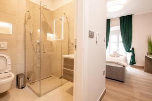 Kúpeľňa v ubytovaní Deluxe apartments & rooms Revis + 37 fotografií