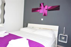 Postel nebo postele na pokoji v ubytování New and modern apartment Karavona Bol