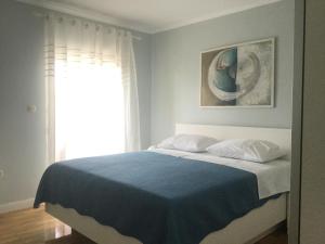 Posteľ alebo postele v izbe v ubytovaní Holiday House Lilija
