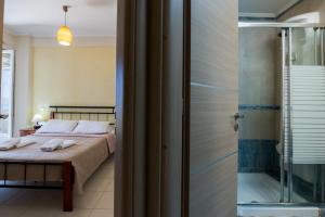 A bathroom at Vasso Apartments 3