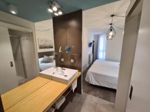 Postel nebo postele na pokoji v ubytování Hotel Jacobeo