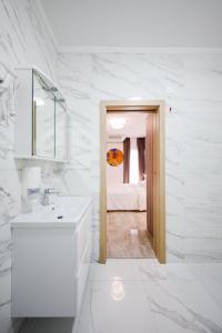 Koupelna v ubytování Hotel Lucija