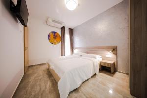 Hotel Lucija客房内的一张或多张床位