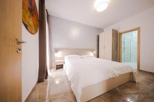 Hotel Lucija客房内的一张或多张床位