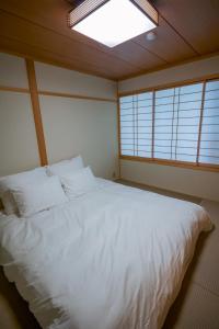 Grand Phenix Hakuba - Vacation STAY 85036にあるベッド