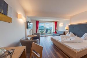 TV a/nebo společenská místnost v ubytování Hotel Meinhardt