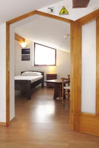Posteľ alebo postele v izbe v ubytovaní Holiday Home Ema by Interhome