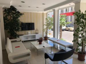 TV a/nebo společenská místnost v ubytování Sinopark Hotel