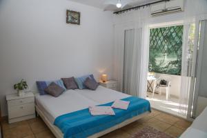 Posteľ alebo postele v izbe v ubytovaní Apartments Butkovic