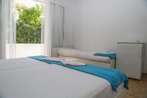 Posteľ alebo postele v izbe v ubytovaní Apartments Butkovic