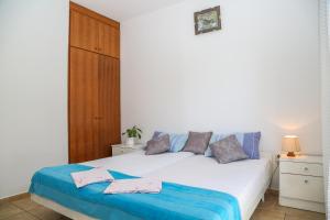 Posteľ alebo postele v izbe v ubytovaní Apartments Butkovic