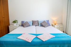 Posteľ alebo postele v izbe v ubytovaní Apartments Butkovic
