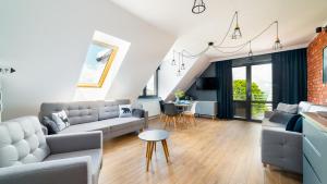 A seating area at Apartamenty Sun & Snow Triventi Mountain Residence