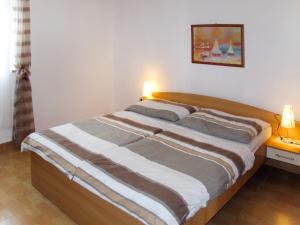 Postel nebo postele na pokoji v ubytování Apartment Teo-1 by Interhome + 16 fotografií