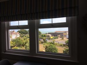 a window with a view of a city at Number Ninety One in Eastbourne