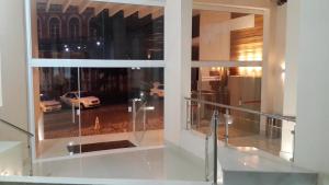 a view of a car through a window at Casablanca Center Hotel in Petrópolis