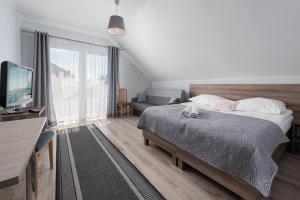 Postel nebo postele na pokoji v ubytování Baltic House