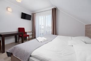 Postel nebo postele na pokoji v ubytování Baltic House