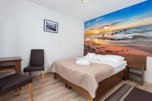 Postel nebo postele na pokoji v ubytování Baltic House
