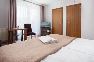 Postel nebo postele na pokoji v ubytování Baltic House