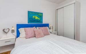 Postel nebo postele na pokoji v ubytování Apartments Vila DK