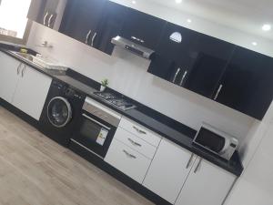 Kuchyň nebo kuchyňský kout v ubytování Résidence Machallah