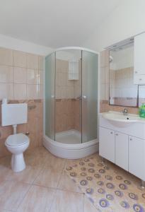 Kúpeľňa v ubytovaní Apartments Casa Nada + 27 fotografií