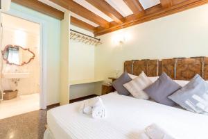 Cama ou camas em um quarto em Residence Suite a Venezia