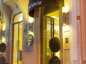 a store with a sign on the front of a building at Taksim Star Hotel in Istanbul