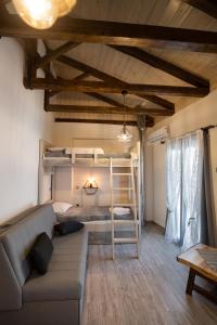 A bed or beds in a room at Stone Villa Hermione