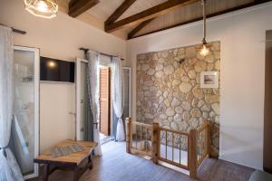 A bed or beds in a room at Stone Villa Hermione