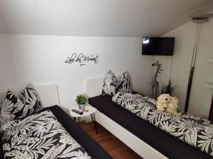Postel nebo postele na pokoji v ubytování Appartement Hofer