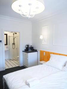 Łóżko lub łóżka w pokoju w obiekcie Apartamenty Stary Browar Oleśnica