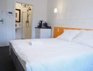 Łóżko lub łóżka w pokoju w obiekcie Apartamenty Stary Browar Oleśnica