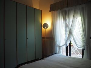 Krevet ili kreveti u jedinici u objektu Appartamento sul Mare