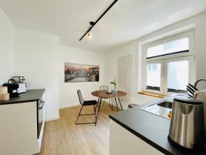 Köök või kööginurk majutusasutuses HafenCity Appartements Stralsund