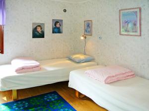 Ένα ή περισσότερα κρεβάτια σε δωμάτιο στο Chalet Öja by Interhome +8 φωτογραφίες