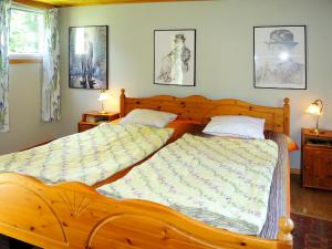 Ένα ή περισσότερα κρεβάτια σε δωμάτιο στο Chalet Öja by Interhome