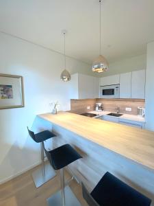 Kuchyň nebo kuchyňský kout v ubytování Hotel Gartenresidence Zea Curtis