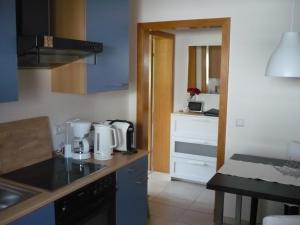 a kitchen with a counter with a coffee maker at Ferienwohnung Meindl 2 in Idar-Oberstein