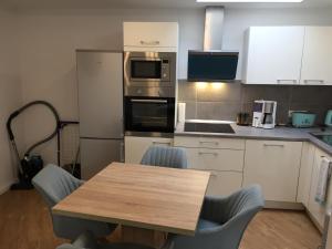 Kuchyň nebo kuchyňský kout v ubytování Apartment der Entspannung