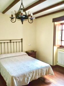 Кровать или кровати в номере Casa Fonso