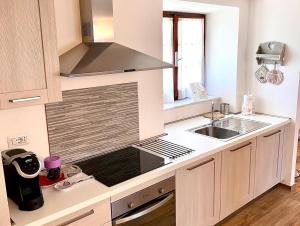 Kuchyň nebo kuchyňský kout v ubytování Cà del fornello + 22 fotografií