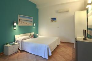 Posteľ alebo postele v izbe v ubytovaní B&B Happy Days Golfo di Gallipoli