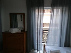 A bed or beds in a room at 85 sqm Apartments New Panorama ELECTRIC CAR ΦΩΡΤΗΣΗΣ STATION